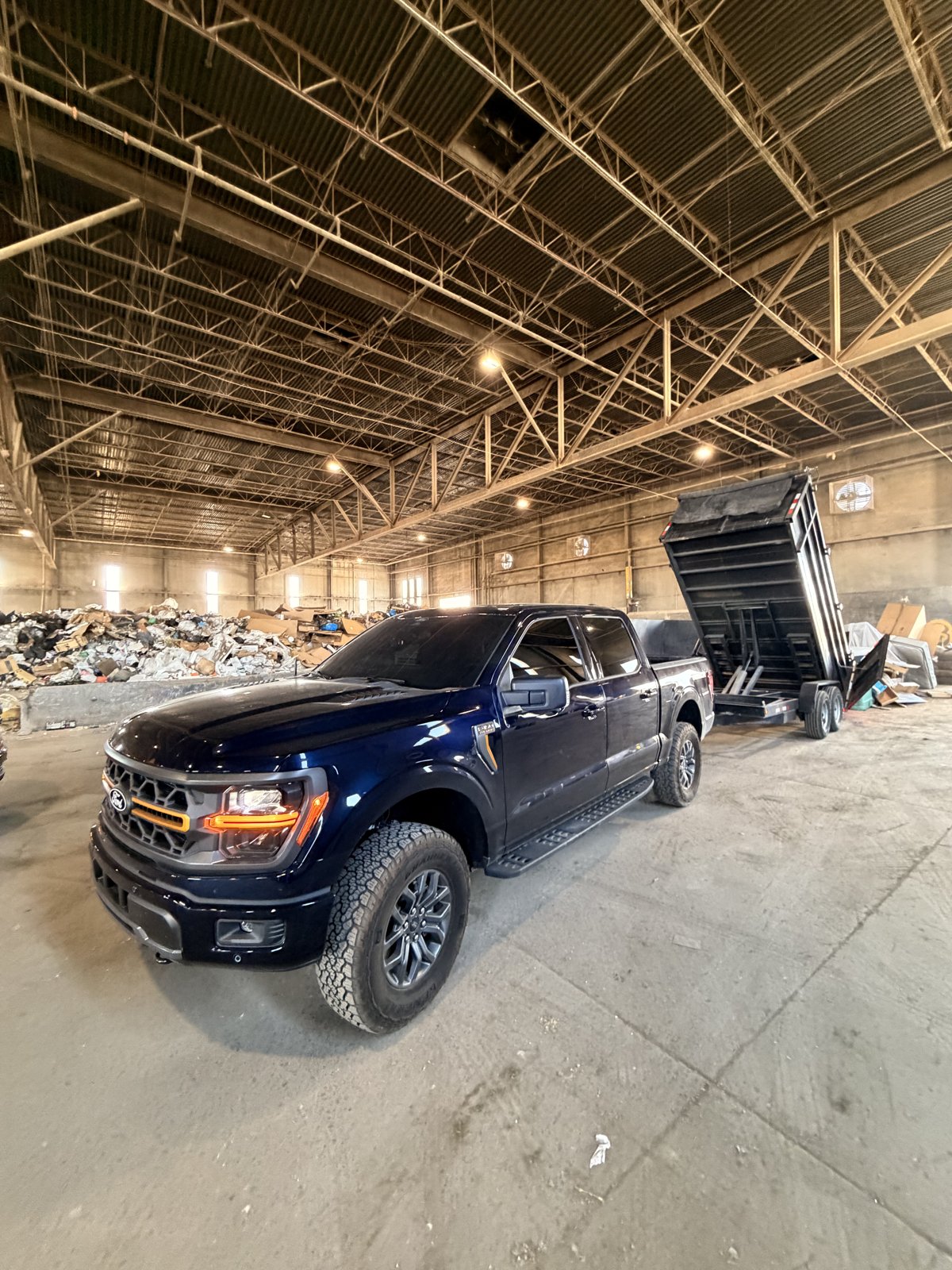 Larsen's Junk Removal truck and trailer ready for a hauling job in Las Vegas
